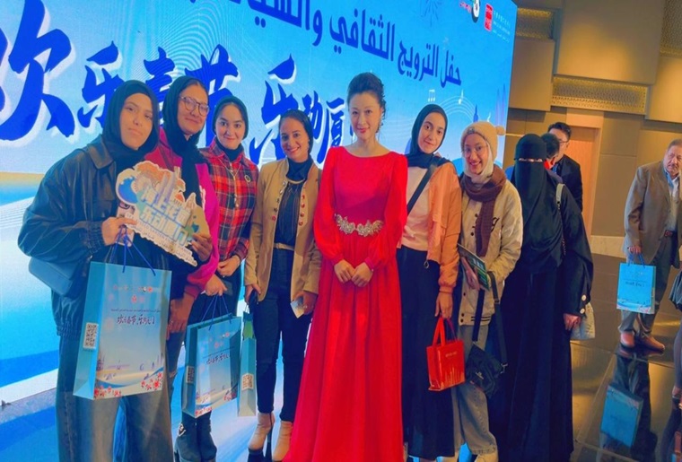 ERU Faculty of Al-Alsun Students participating in a cultural and tourism promotion event for the Chinese city of Xiamen.